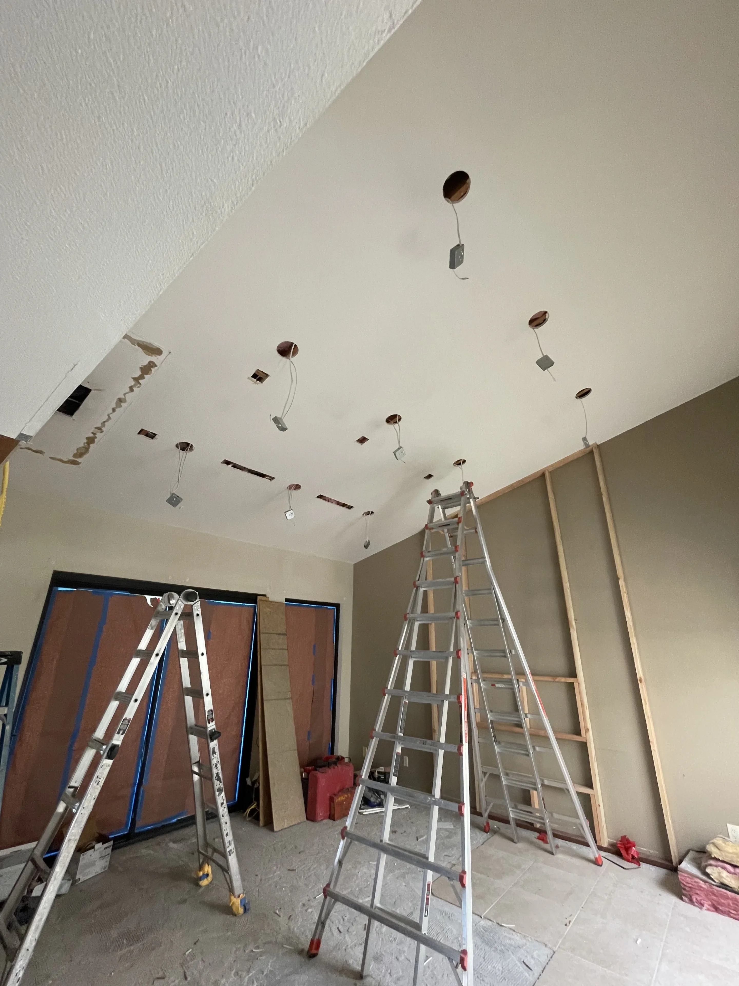 Custom ceiling lighting with multiple fixture layers