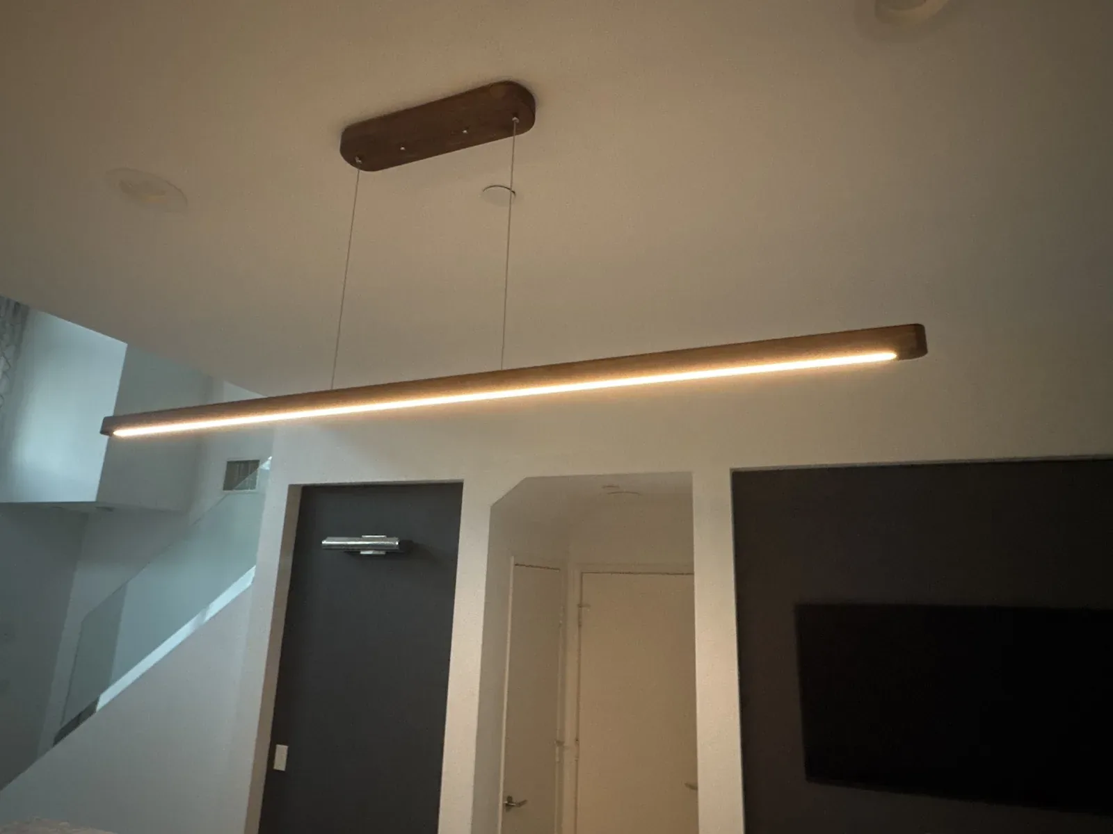 Linear pendant light repaired and installed for a customer project